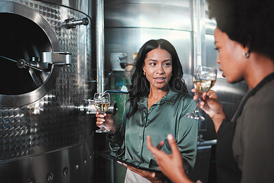 Buy stock photo Woman winemaker discuss, planning and tasting wine in a distillery to expand the business. Alcohol management, professional or expert drinking a glass while collaborating for a startup winery cellar