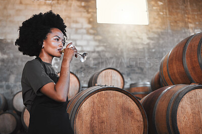 Buy stock photo Wine, drink and cellar woman tasting a glass from their manufacturing or farming distillery plant as part of quality checklist. Agriculture, sustainability and winery farm worker in brewery warehouse
