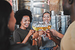 Happy friends in a wine cellar toasting champagne glasses on farm during a getaway wine tasting celebration or success. Luxury, expensive and vintage alcohol wine tasting in the winemaking industry