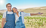 Grape farm, vineyard and farmer couple with proud, welcome and success portrait showing their small business in countryside or agriculture industry. Sustainable farming people with nature background