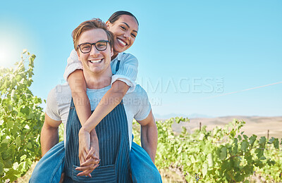Buy stock photo Happy and playful interracial farming couple with smile bonding with piggy back. Business people, man and woman agriculture worker in farming industry or nature on a grape farm during summer in love 