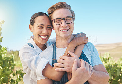 Buy stock photo Interracial couple, love and happy man and woman in hug or embrace on wine tasting farm. Portrait of fun, trust or playful people on sustainability countryside, vineyard estate and agriculture field