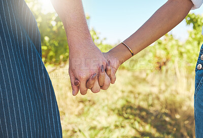 Buy stock photo Love, support and couple of people holding hands in solidarity. Respect, trust and unity in relationship with partner. Woman and man happy with romantic and caring partnership together. 