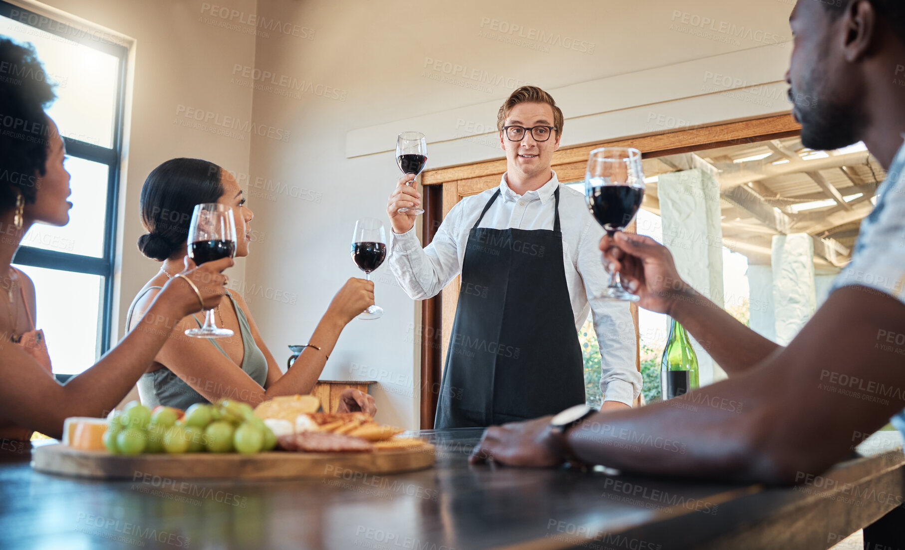 Buy stock photo Toast, friends and brunch or red wine tasting at farm real estate house for celebration event with food, grapes and alcohol. Wow, group vacation to vineyard for spring party drinks in a glass 