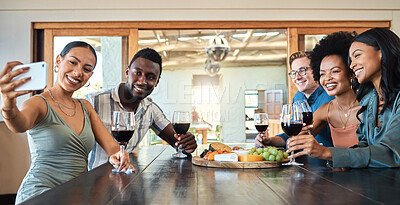 Buy stock photo Diverse friends taking selfie on a phone while bonding,  drinking wine and eating together at a restaurant. Fun group enjoying gathering, reunion, laughing, talking and celebrating friendship