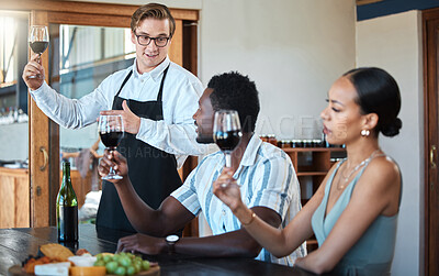 Buy stock photo Wine tasting with black couple and professional sommelier explaining the blend and flavor of red wine. Couple enjoying a drink, learning about wine making process at a restaurant with happy winemaker