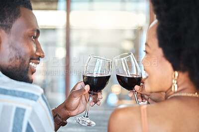Buy stock photo Couple giving cheers, toast and celebrate with wine glass, champagne and alcohol drinks on a romantic date together. Love, relax and smile black people in celebration of happy marriage relationship