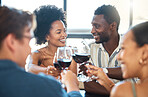 Friendship, celebration and luxury wine toast with a fun group at an event or restaurant, bonding and talking. Happy, diverse friends enjoying a wine tasting and fine dining, celebrating good news 