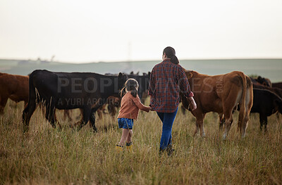 Buy stock photo Cow farmer, mother and girl on farm, agriculture nature or cattle sustainability countryside field. Family bonding and working on healthy environment for cattle in meat, beef or food industry