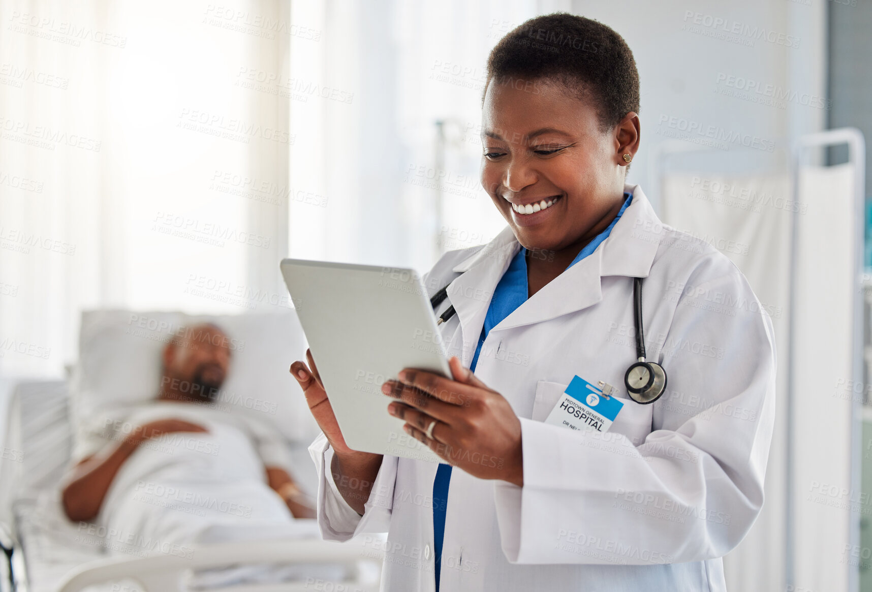 Buy stock photo Happy news with doctor reading exciting email or test results on digital tablet, feeling positive at hospital. Young health care worker getting good news of cure or treatment for her sick patient