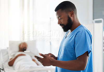 Buy stock photo Black doctor using a digital tablet while working with sick patients at a hospital, serious and thinking. African American health care worker using online organizer or planner to keep track of task