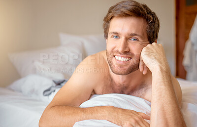 Buy stock photo Relax, home and bedroom with a young man lying in bed in the morning after waking up in his house. Resting, relaxation and time off with a male looking comfortable and happy with a smile on a weekend