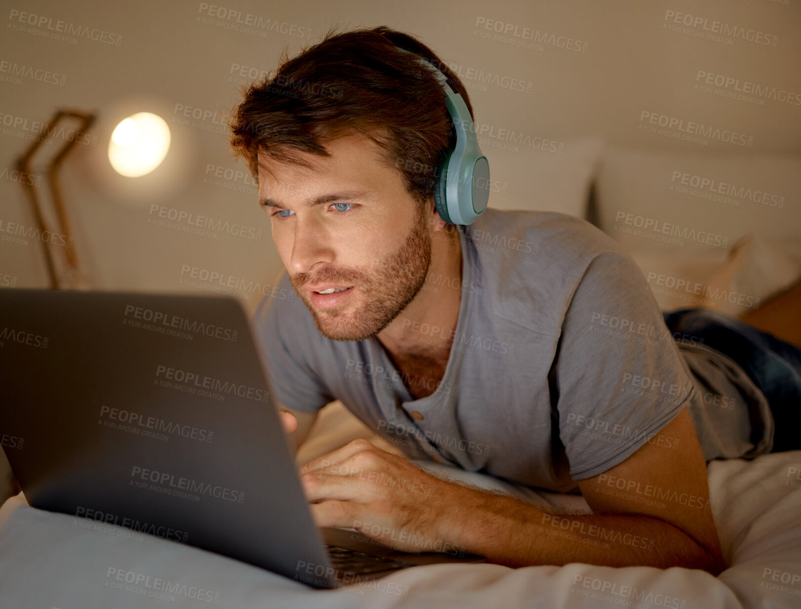 Buy stock photo Online, laptop and late night stream or work in the bedroom. Man using internet on pc to watch series, esports or gaming to relax. Stress management and entertainment with online technology at home.