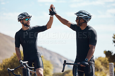 Buy stock photo High five, winner and cycling team of cyclists having fun riding together outdoors in nature. Happy, excited and fit male bicycle riders on a break after exercising and training in the environment