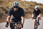Training, energy and fitness with athlete exercise on bicycle outdoors, practice speed and endurance. Cyclists riding together, prepare for marathon or competition while enjoying cardio workout