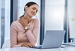 Stress woman suffering from neck pain working on a laptop in a modern office. Corporate professional with bad posture and an injury. Business SEO worker with discomfort from long hours at a desk