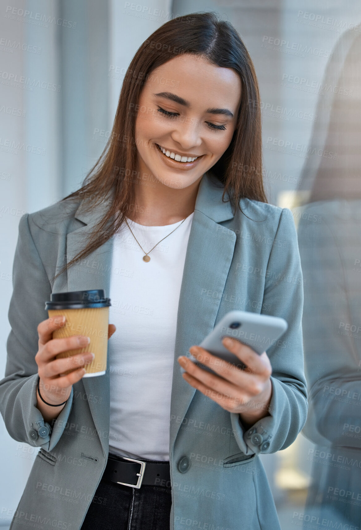 Buy stock photo Business woman communication on phone with social media app, web internet technology and coffee cup break in startup company. Happy, smile and content office worker reading funny mobile notification