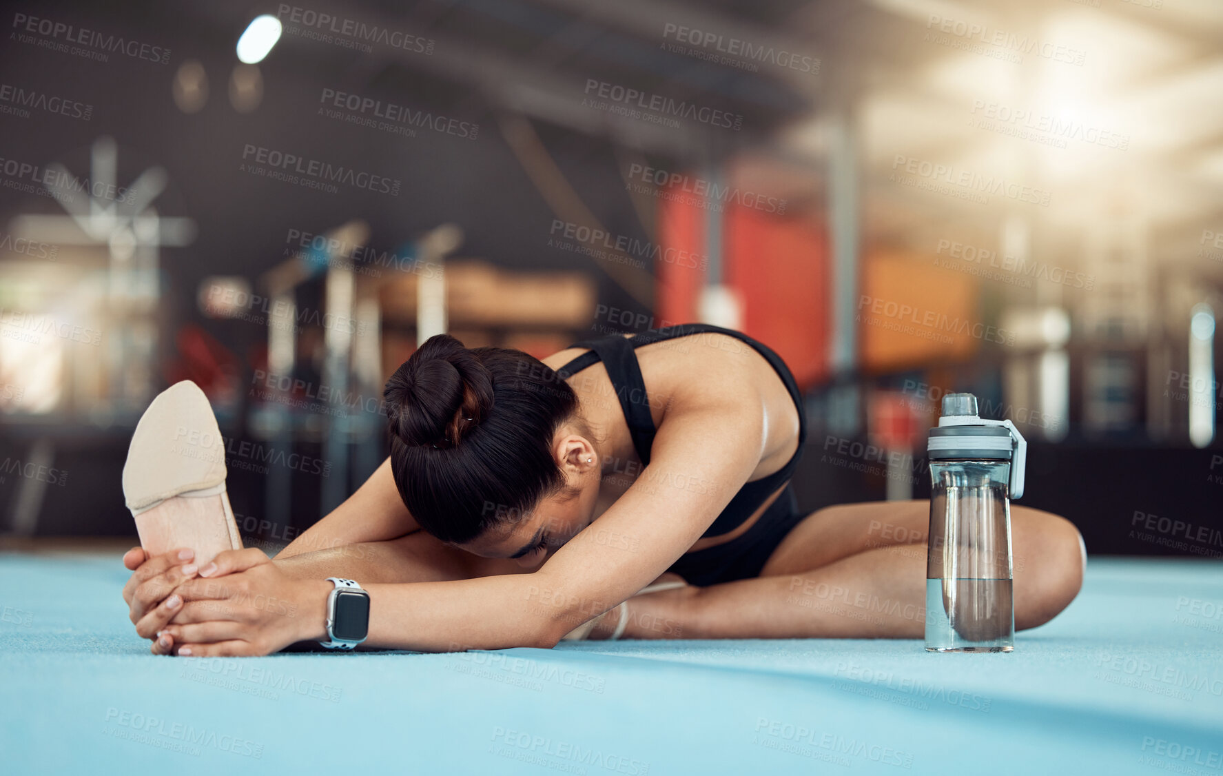 Buy stock photo Woman stretching legs for fitness training at gym, yoga for exercise at health club and sports workout for wellness and strong body. Gymnast doing pilates and gymnastics on floor for cardio sport