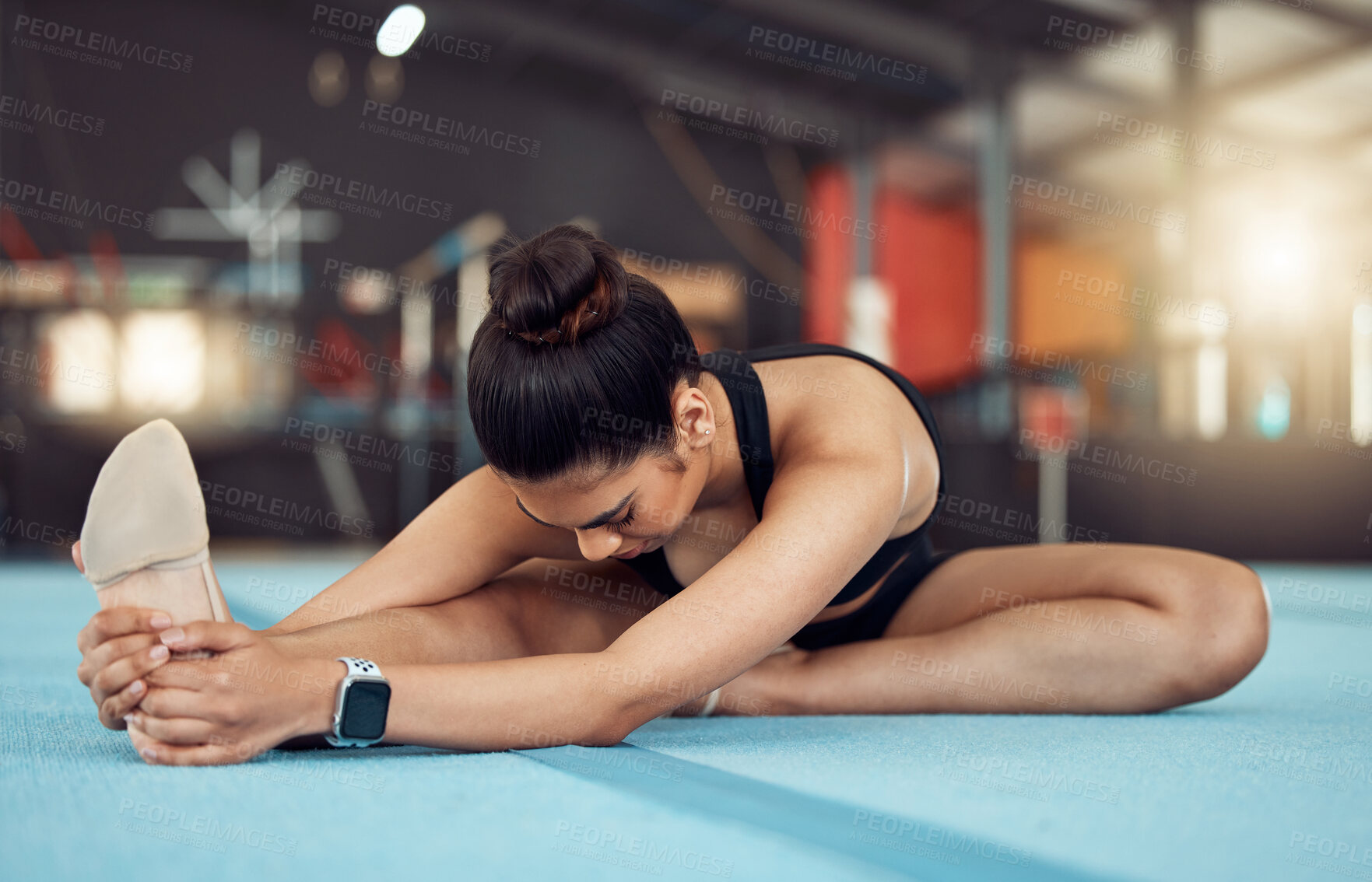 Buy stock photo Exercise, fitness and health, woman in a gym, stretching before workout. A girl, gymnast or dancer doing yoga or pilates to start training. Motivation, wellness and sports for healthy, fit lifestyle