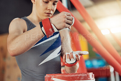 Buy stock photo Gym chalk, gymnast man and sports workout goal, fitness or exercise to train. Health training, practicing and fit sport athlete with magnesium carbonate dust for fight, strength or wellness.

