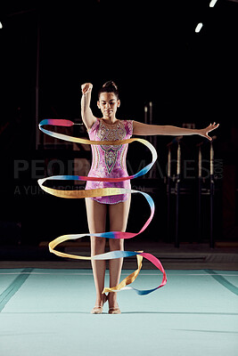 Buy stock photo Ribbon dancer, woman and stage performance or practice at gym. Girl with flexibility does physical and artistic sports training. Balance, strong and gymnastic body of young athlete with discipline. 