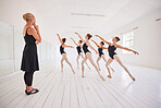 Ballet teacher teaching a dance class in studio, teen girls dancing for performance in a room and learning a creative art at school. Ballerina dancer in rehearsal with coach and being fit and elegant