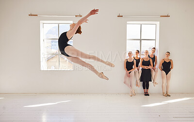 Buy stock photo Dance studio, ballet and jump in air while class watches girl student move with agility and grace. Ballerina woman with talent and good body coordination in training lesson with youth dance team.