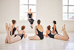Ballet education school teacher speech to learning students or kids at performance art studio. Woman or coach help and training creative dance exercise to academy team, girl or people relax on floor