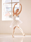 Dance, ballet and studio with a woman dancer training, practicing or dancing for a performance, recital or rehearsal. Artistic, perform or technique with a young female in a school for production art