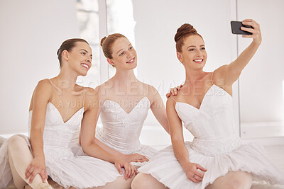 Buy stock photo Ballet, dance and selfie on a phone with a ballerina, dancer and perfromance artist in a dancing studio. Smile, photograph and costume with creative and artistic performers in a floor for production