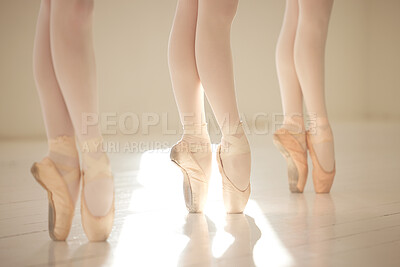 Buy stock photo Ballet dance woman legs in studio training, exercise and working on performance for competition. Ballerina shoes, teamwork and creative art academy school students learning dancing routine
