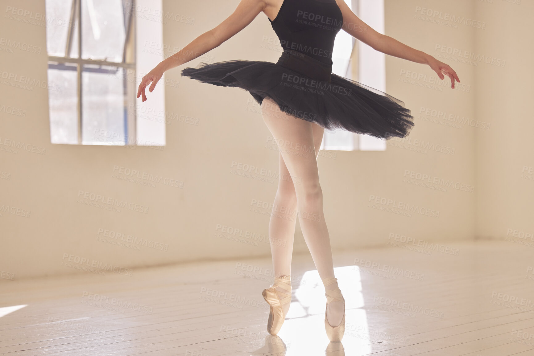 Buy stock photo Fitness, exercise and the art of ballet, dancer on her toes in pointe shoes and tutu, Woman ballerina training for theatre performance in dancing studio. Beauty, grace and elegance in creative sports