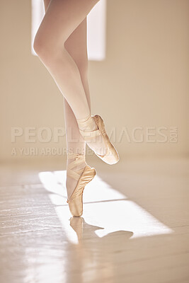 Buy stock photo Ballet, dance and balance of a dancer shoes, ballerina and performance artist alone in a studio. Legs and toes for training, practice and rehearsal with technique and skill in artistic dancing sport.