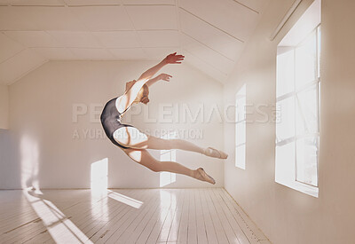 Buy stock photo Woman ballet dancer dancing in a dance studio mockup white walls and sunlight. Young professional girl, art or sports student jumping mid air technique in a creative ballerina class