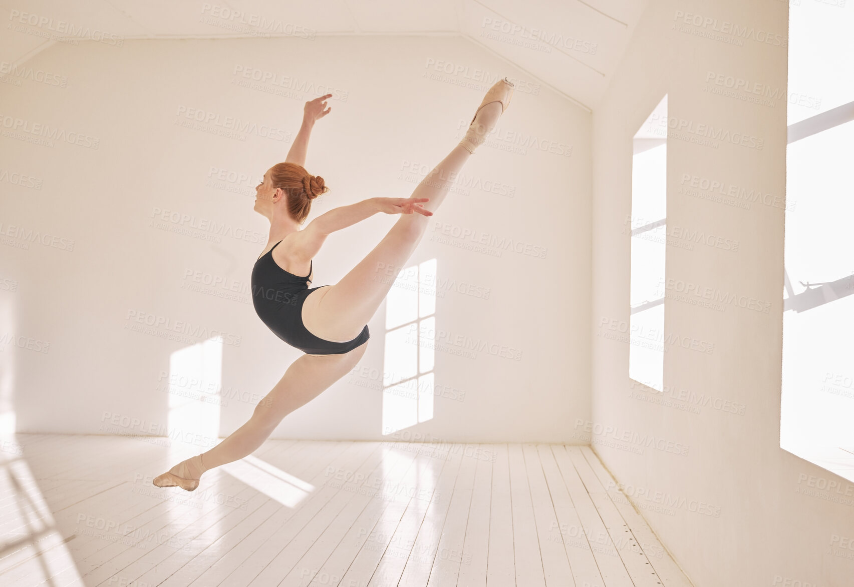 Buy stock photo Ballet, jump and performance dance studio with young student. Dancer girl with energy in isolated classroom and moving in the air. Beautiful woman ballerina with strong body and stunning posture.