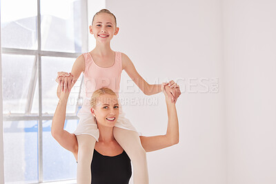 Buy stock photo Portrait of ballet teacher carrying girl student with smile in a dance classroom or studio. Woman and young ballerina having fun after learning, training and practice dancing in a theater together 