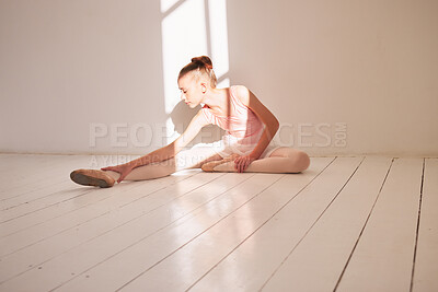 Little Girl Lying On The Floor And Doing Stretching Exercises With Her  Teacher At Studio Stock Photo, Picture and Royalty Free Image. Image  65119506.