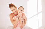 Portrait ballet teacher and child hug in studio with happy smile and love relationship. Happy of woman and girl after learning dance and creative theater art after practice lesson or training