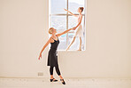 Art, ballet and dance teacher with girl ballerina practicing posture by a window in a studio. Creative child dancer training with an instructor for a recital concert. Young student dancing with coach