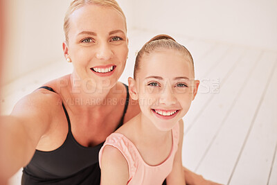 Buy stock photo Family, dance and ballet with a mother and her young daughter taking a selfie in a dancing studio for the performing arts. Portrait of a child ballerina and her parent training for a recital or show