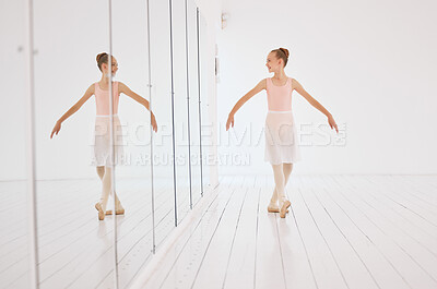Buy stock photo Fitness, exercise and the art of ballet, young dancer watching herself in a mirror. Happy, confident and learning to love dance and dancing the lifestyle. A ballerina girl training alone in a studio.
