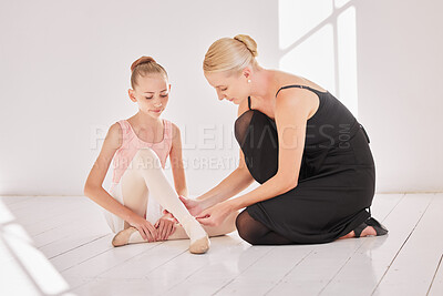 Buy stock photo Ballet teacher, injured student and dance injury in class with dancer girl sad about ankle pain at art school. Ballerina child performer getting a foot massage during training for theatre performance