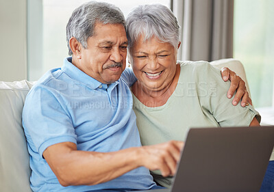 Buy stock photo Elderly couple laptop on video call, social media or internet on their laptop on living room sofa. Relax senior man and woman watching or reading news, email or funny message online together at home 