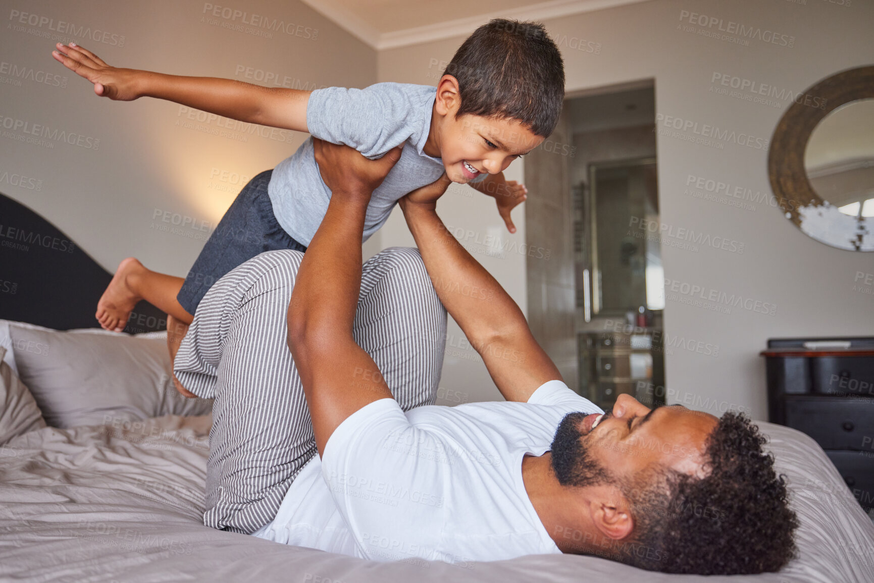 Buy stock photo Father and kid on bed with fun games for child development in bedroom, home and house in the morning. Happy, love and care of dad and child with imagination, creative game and happiness together