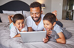 Happy, father and kids watching entertainment shows on digital tablet in the bedroom at home. Technology, man and children relax on bed together to bond and have fun streaming with fast 5g internet.
