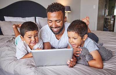 Buy stock photo Happy, father and kids watching entertainment shows on digital tablet in the bedroom at home. Technology, man and children relax on bed together to bond and have fun streaming with fast 5g internet.