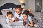 Technology, man and children relax on bed together to bond and have fun on the weekend with digital tablet. Happy father having quality time with his kids at family home for bonding relationship.