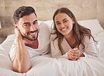 Love couple relax on bedroom together in house, apartment or home. Portrait of smile people, intimate partner and content man and woman in safe, happy and care marriage relationship with happiness