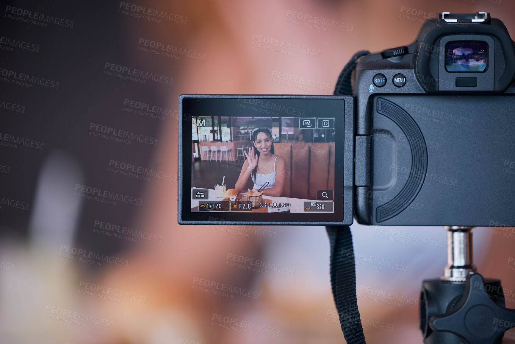 Buy stock photo Woman influencer on digital camera screen recording vlog for online social media video. Creative young female content creator presenting internet or web content for her website or podcast at a cafe