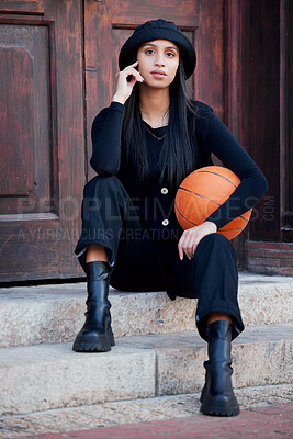 Buy stock photo Fashion model, influencer and young woman with basketball posing on steps in urban city. Portrait of trendy, stylish and cool person with funky attitude, grunge personality and modern black clothes